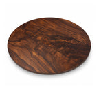 A round wooden serving board with a rich dark brown wood grain pattern. Spinning Lazy Susan